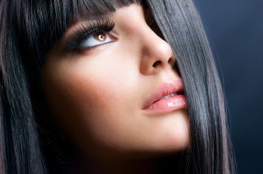 Fashion Brunette . Beautiful Makeup and Healthy Black Hair clipart