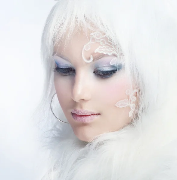 Beautiful Girl's Face. Creative Winter Makeup Stock Photo