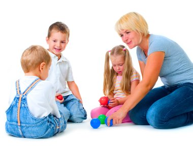 Children playing on the floor with Teacher.Happy kids.Education. clipart