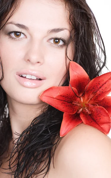 Schöne sexy junge Frau mit Blume — Stockfoto