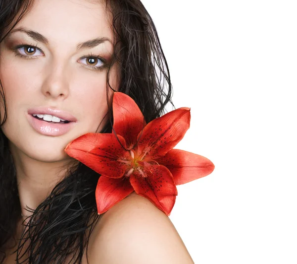 Krásná sexy mladá žena s květinou — Stock fotografie