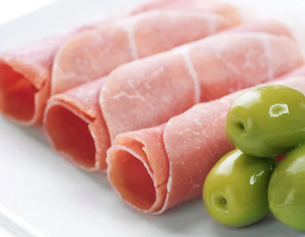 Verse prosciutto rolt close-up — Stockfoto