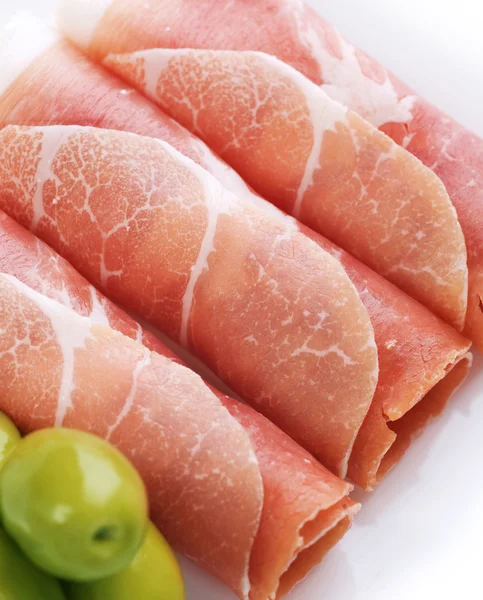 Fresh prosciutto rolls closeup — Stock Photo, Image