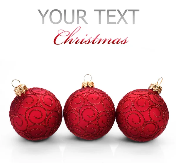 Christmas Baubles over white Royalty Free Stock Photos