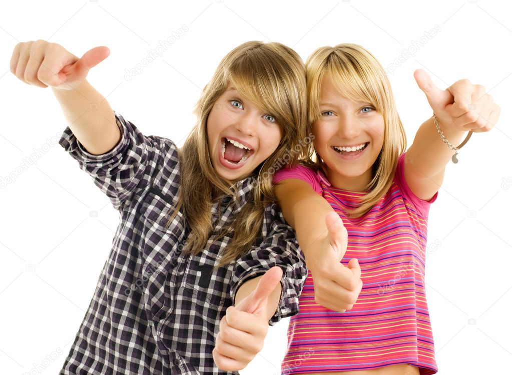 Portrait of happy teen girls showing thumbs up isolated one whit Stock  Photo by ©Subbotina 10676025