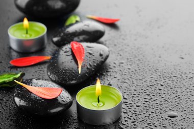 spa taşları ve mumlar