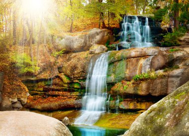 Waterfall in forest clipart