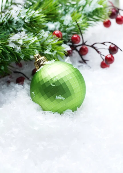 Christmas Decorations over Snow background — Stock Photo, Image