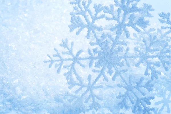 Schneeflocken grenzen an Schnee. Hintergrund Winterurlaub — Stockfoto
