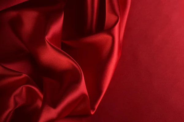 Röd siden bakgrund med kopia-utrymme — Stockfoto