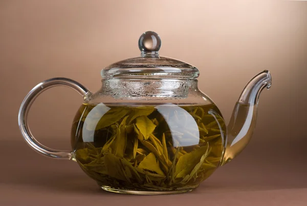 Tea teáskannában — Stock Fotó