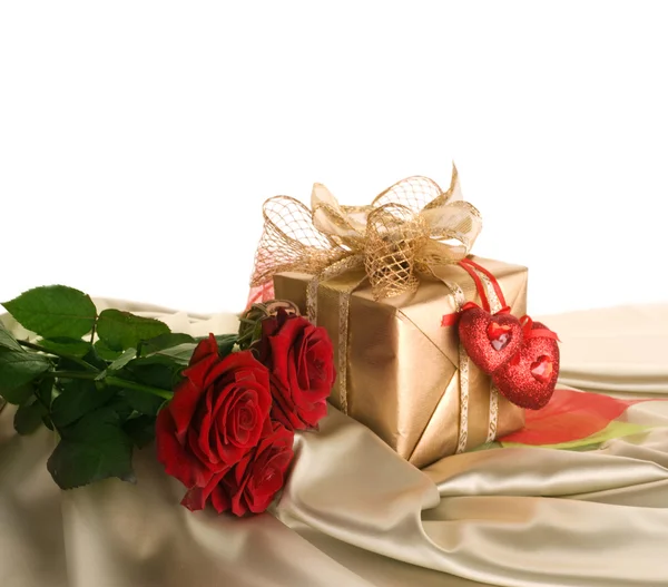 Gift Box And Red Roses Stock Photo