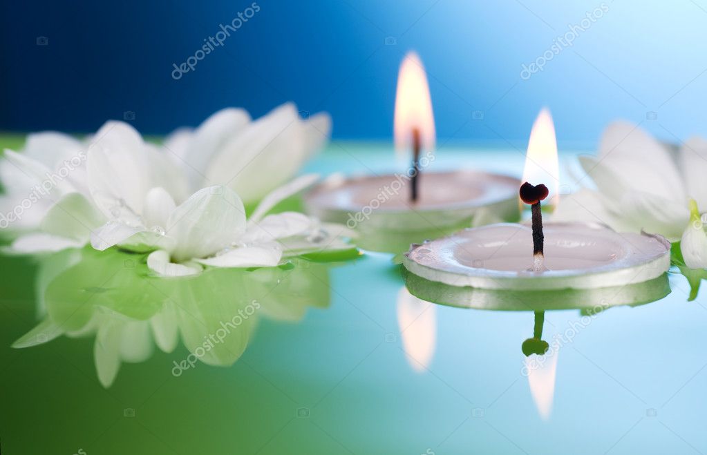 Burning Floating Candles And Flowers Stock Photo by ©Subbotina 10685283