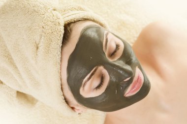 Spa. Mud Mask On The Woman's Face clipart