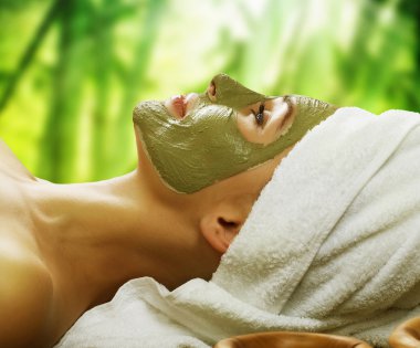 Woman in Spa. Mud Mask clipart