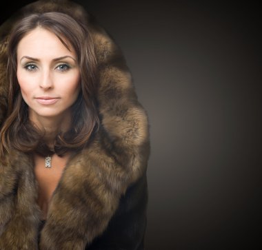 Beautiful Young Woman In Luxury Mink Coat