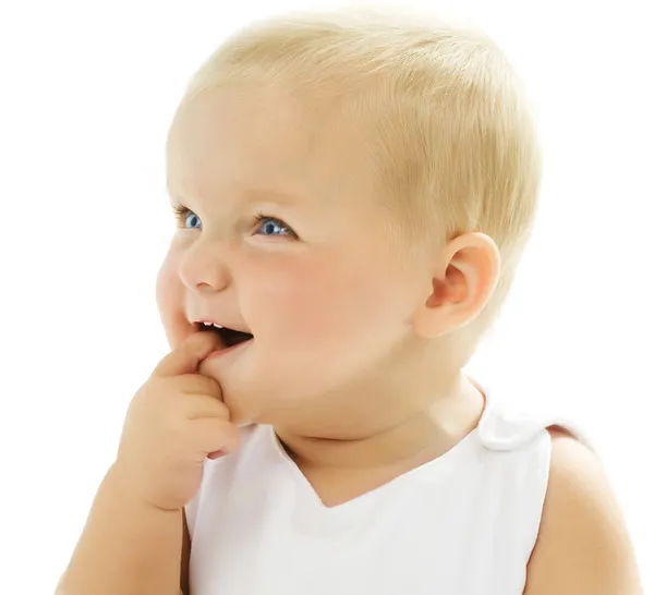 Niedliches kleines Mädchen, das ihre Zähne berührt — Stockfoto
