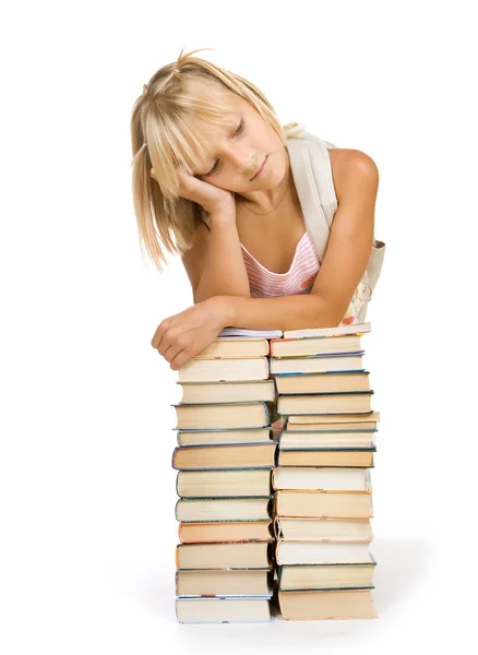 Vissza ehhez: iskola fogalmát. Iskola lány felett a kupac könyvek — Stock Fotó