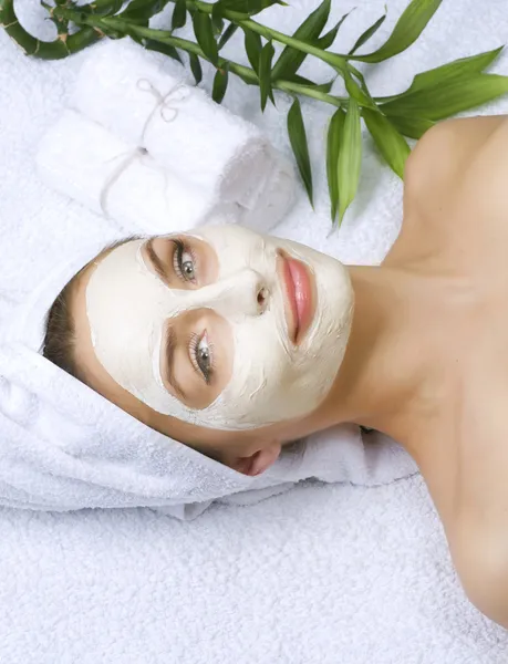 Beautiful Woman Getting Spa. Clay Facial Mask. Dayspa Stock Photo