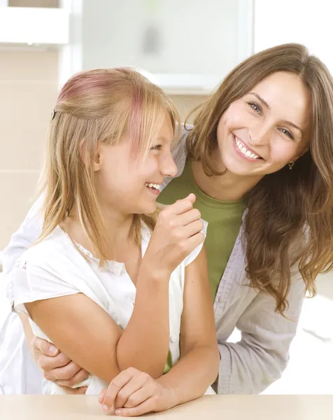 Mother with teenage Daughter having fun. Kitchen.Happy family — Stock Photo, Image
