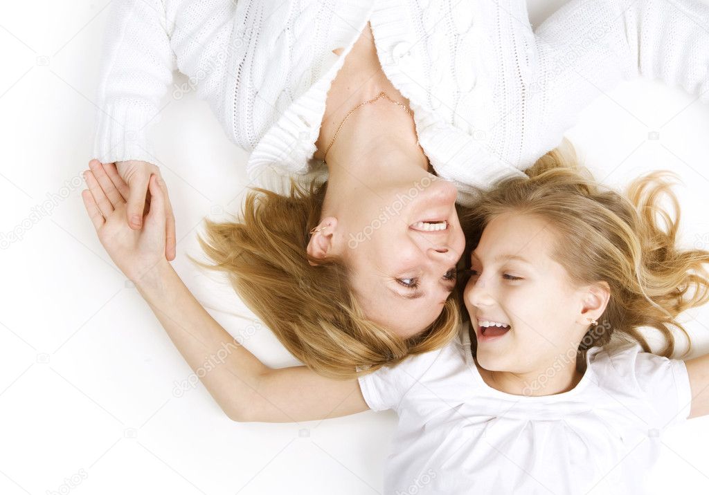 Happy Family. Mother with teenage Daughter over white