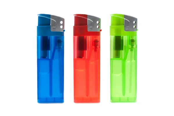 stock image Three colour lighters