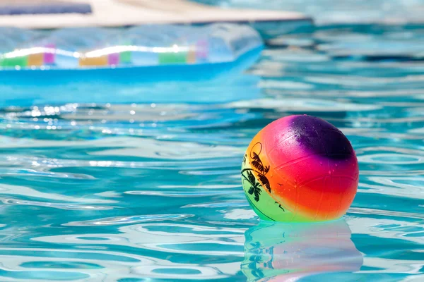 Ball in the swimming pool Stock Photo