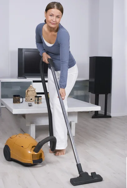 Young lady in cleaning — Stock Photo, Image