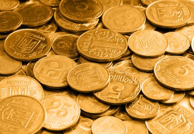 Gold coins as a background or texture clipart