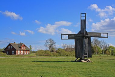 Old windmill and farmhouse clipart