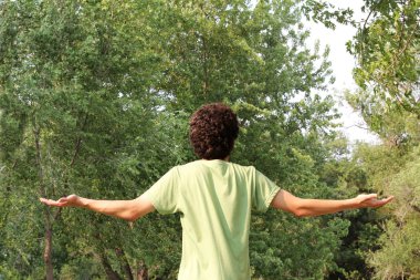 A Spiritual Young Man Worships clipart