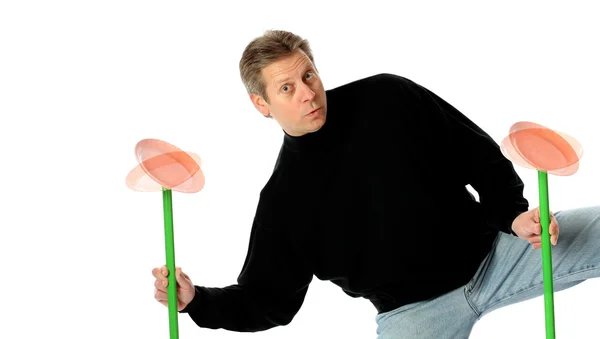Многозадачность человека, жонглирующего прядильными платформами — стоковое фото