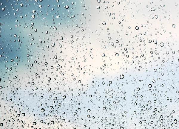 Gotas de chuva azul — Fotografia de Stock