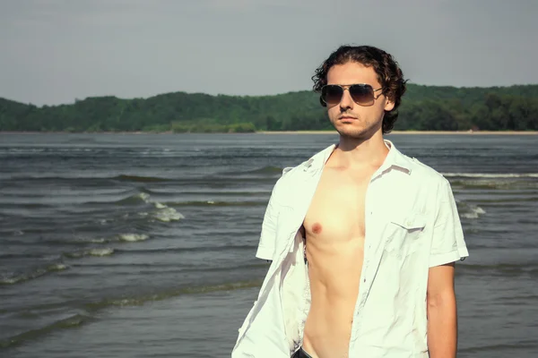 stock image Sexy man on the beach