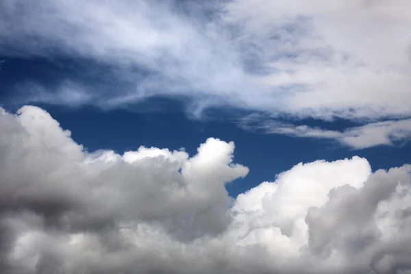 stock image Fantastic soft white clouds against blue sky