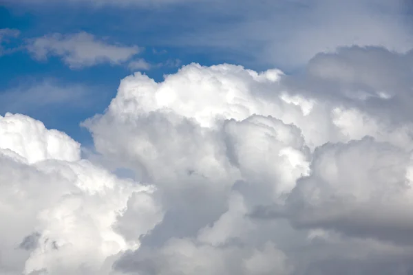 stock image Fantastic soft white clouds against blue sky