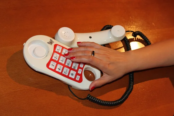 Mão e telefone — Fotografia de Stock
