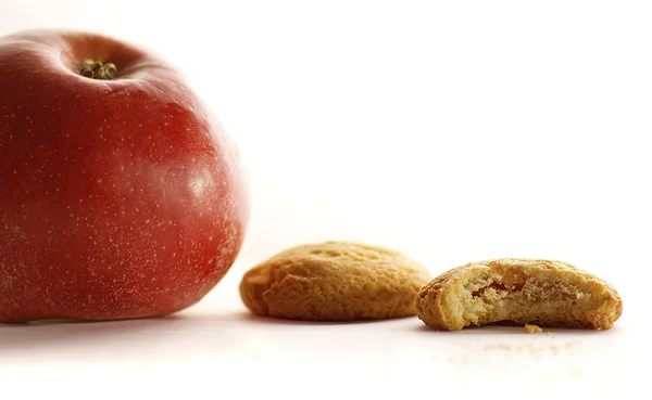 Bolachas e maçã — Fotografia de Stock