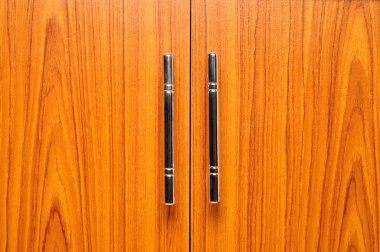 Light brown doors with metal handles clipart