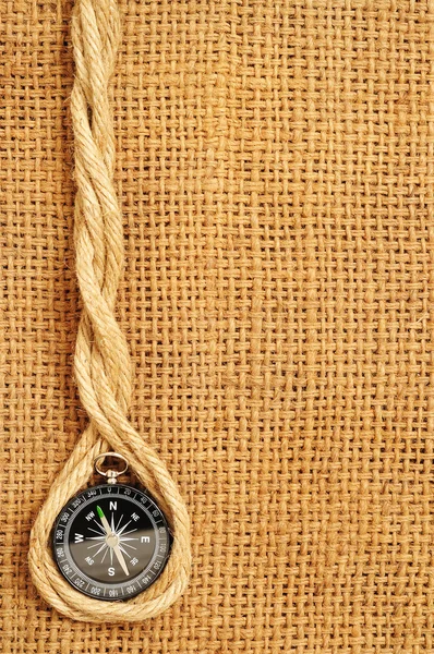 stock image Frame of compass and ropes on sack