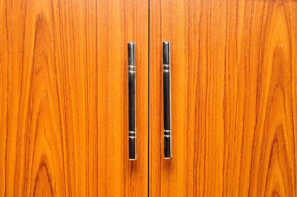 Lekkie brązowe drzwi metalowe uchwyty — Zdjęcie stockowe