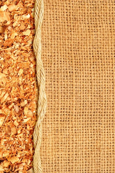 stock image Sawdust flakes piled on logs of sack