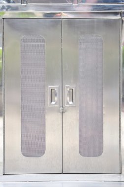 Cabinet doors and aluminum. clipart