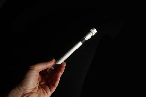 Uma lâmpada moderna em uma mão — Fotografia de Stock