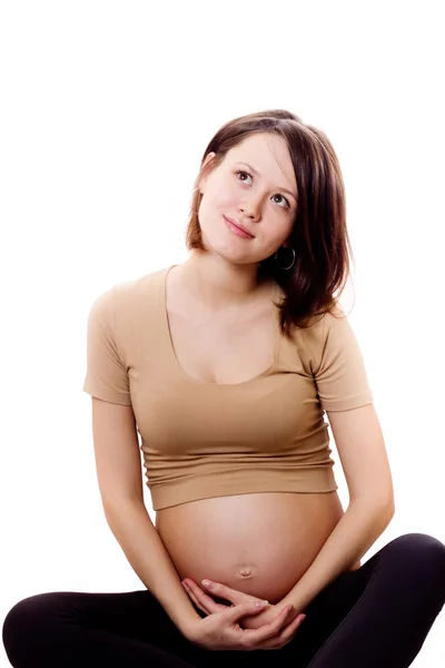 stock image Beautiful pregnant woman looking up