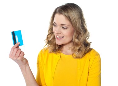 Attractive female holding her credit card clipart