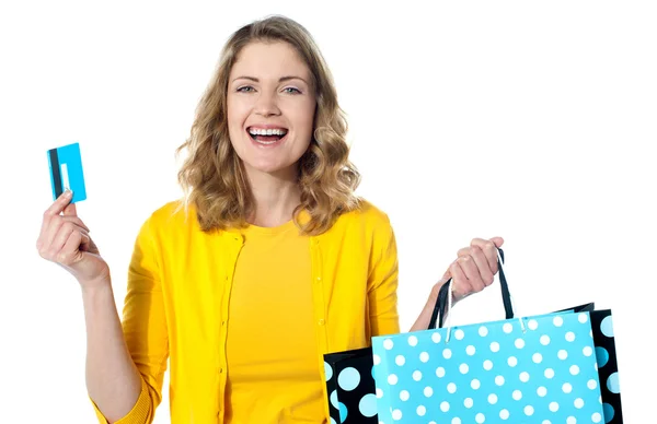 Happy shopaholic female laughing — Stock Photo, Image