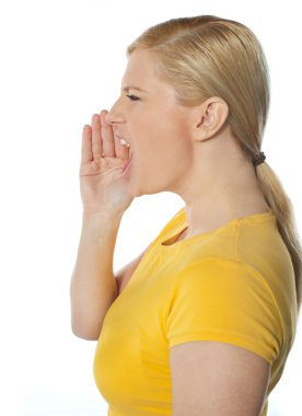 Side view of shouting teenager