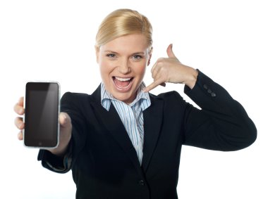 Saleswoman displaying new iphone to camera clipart