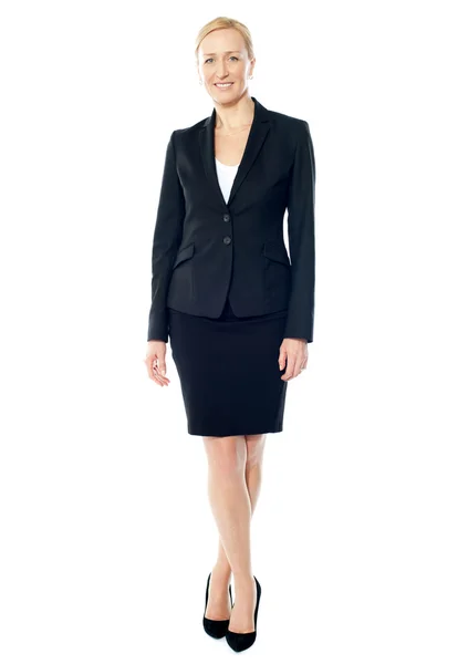 Gorgeous female executive posing with crossed legs — Stock Photo, Image